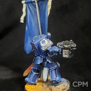 Описание картинки Space marine Terminator с флагом от Superguns по цене 1 400руб | Свободный Рынок Миниатюр - СРМ
