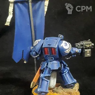 Описание картинки Space marine Terminator с флагом от Superguns по цене 1 400руб | Свободный Рынок Миниатюр - СРМ