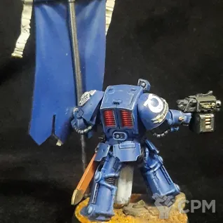 Описание картинки Space marine Terminator с флагом от Superguns по цене 1 400руб | Свободный Рынок Миниатюр - СРМ
